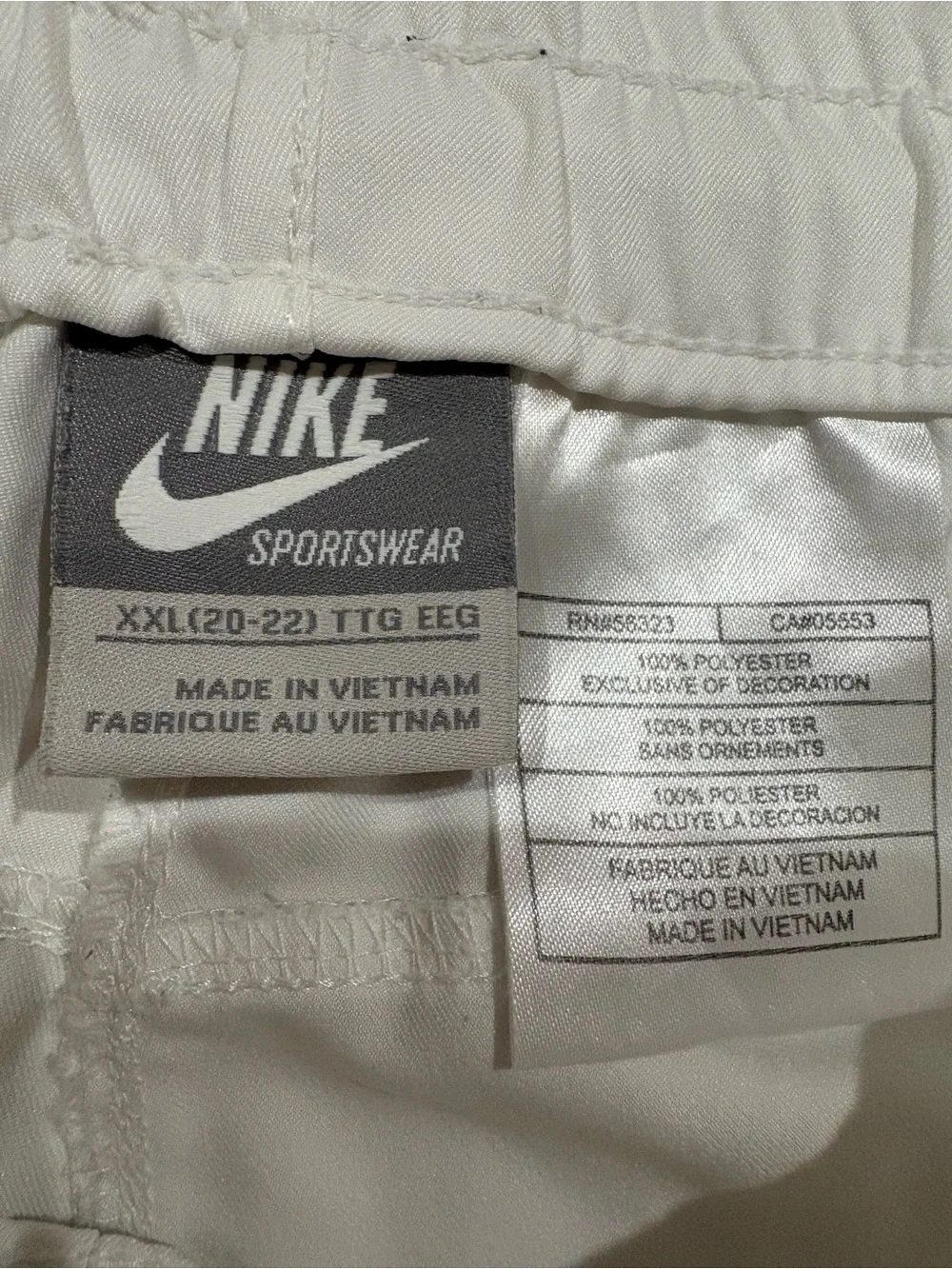 cropped white nike track pants